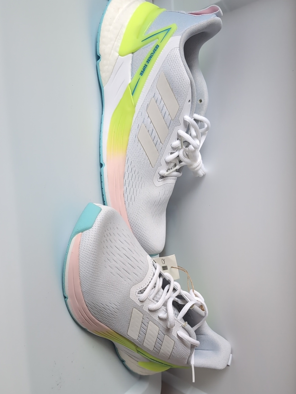 AdidasWhite Running Shoes with Neon Yellow and Pastel Accents